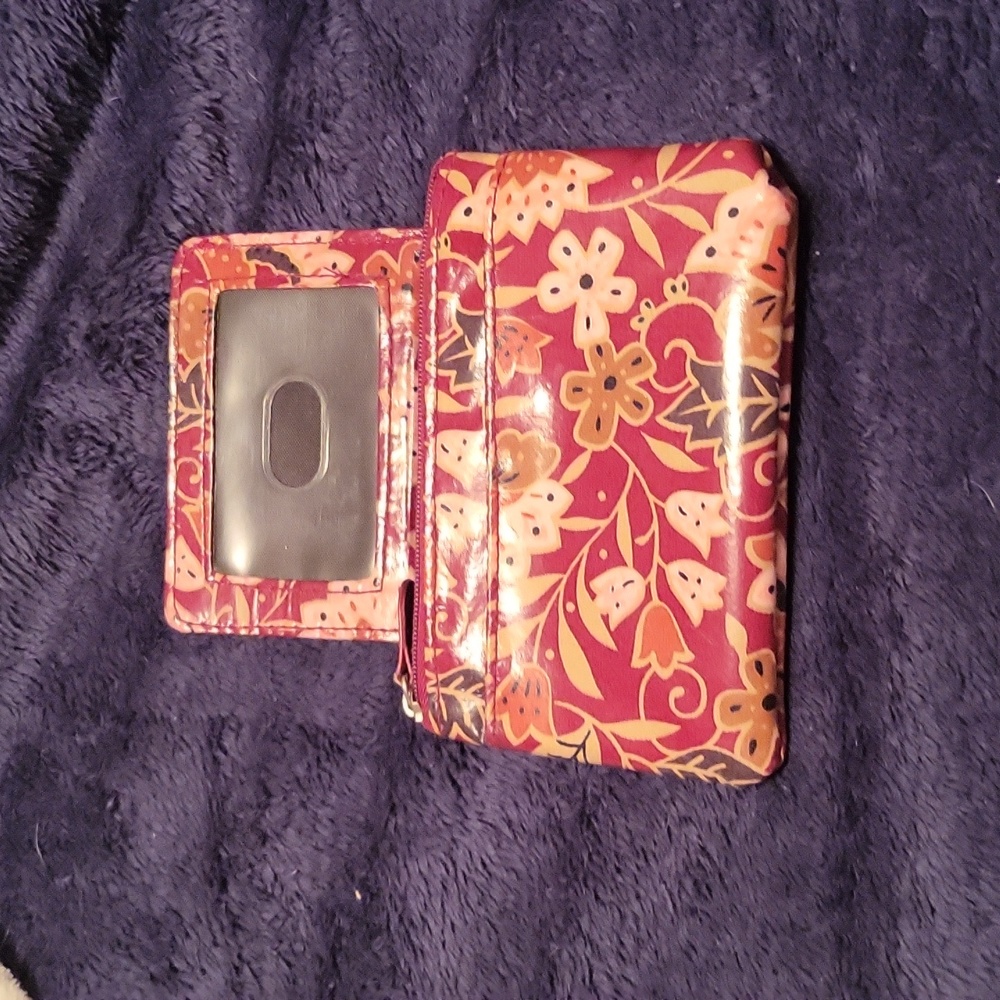 Change purse with removable credit card or license holder.